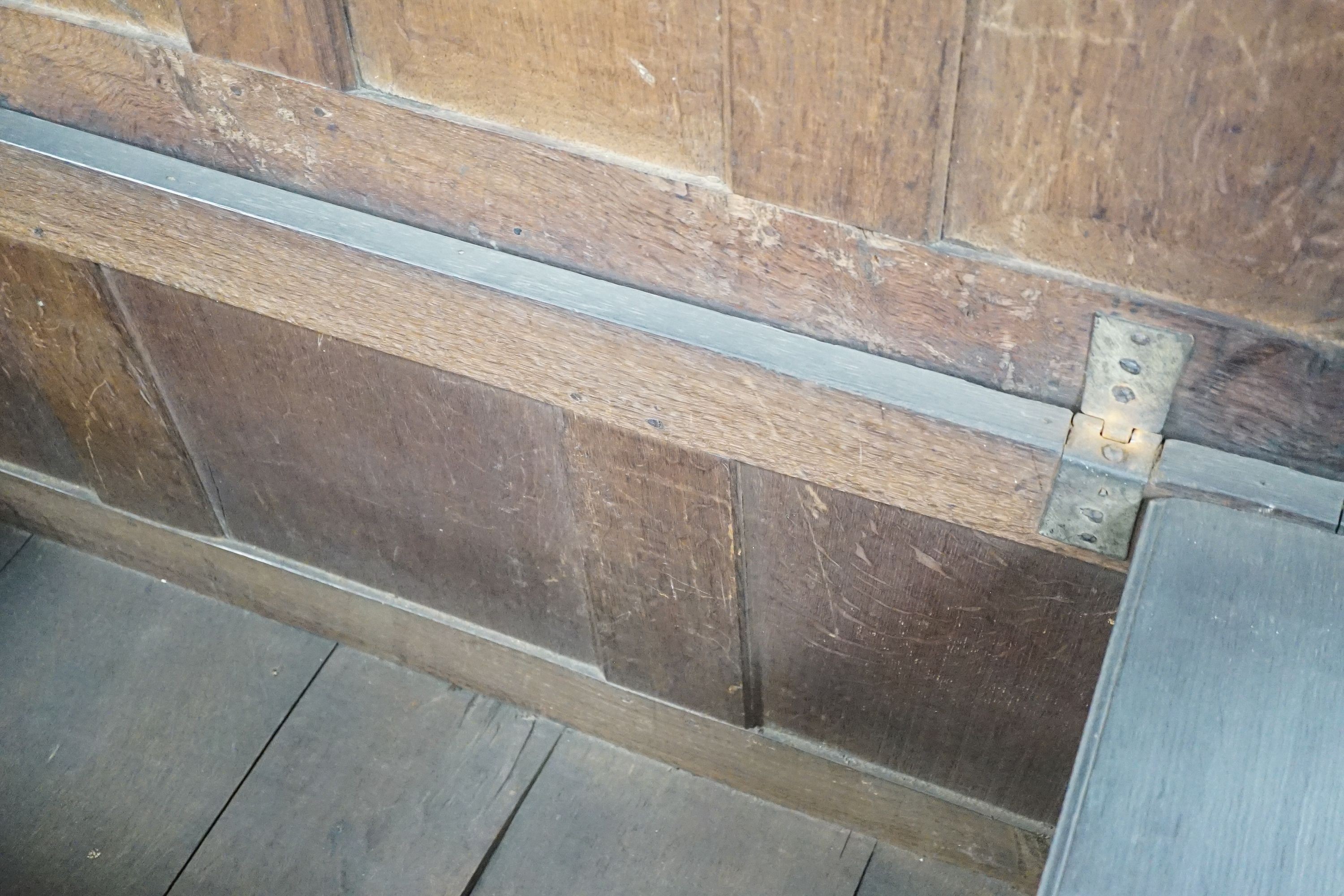 A 17th century Gloucestershire area carved, panelled oak coffer, length 150cm, depth 58cm, height 69cm